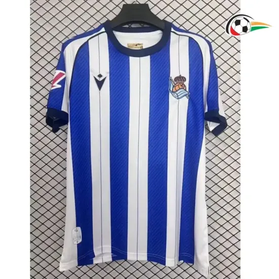 Real Sociedad Equipacione Futebol Local 2025/26 com Patch da La Liga Azul/Branco Real Sociedad Equipacione Futebol Local 2025/26 com Patch da La Liga Azul/Branco